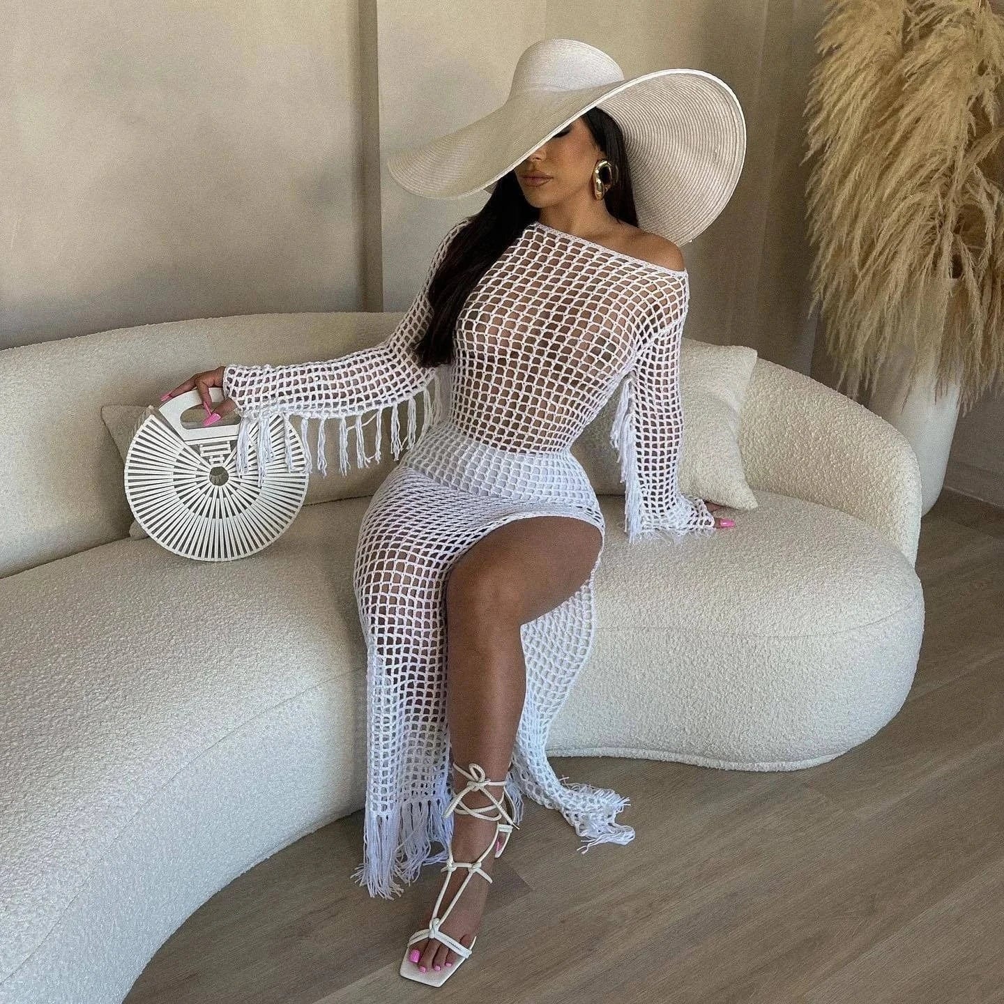 2024 Summer Fashion New Knitted Tassel Beach Skirt Hollow Perspective Sexy Dress For Women