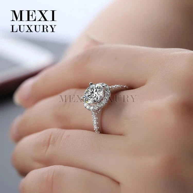 6.5 / White gold 18K white gold Anniversary prong setting Round brilliant cut moissanite ring