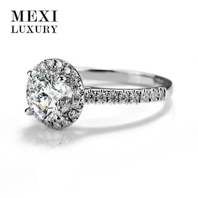 6.5 / White gold 18K white gold Anniversary prong setting Round brilliant cut moissanite ring
