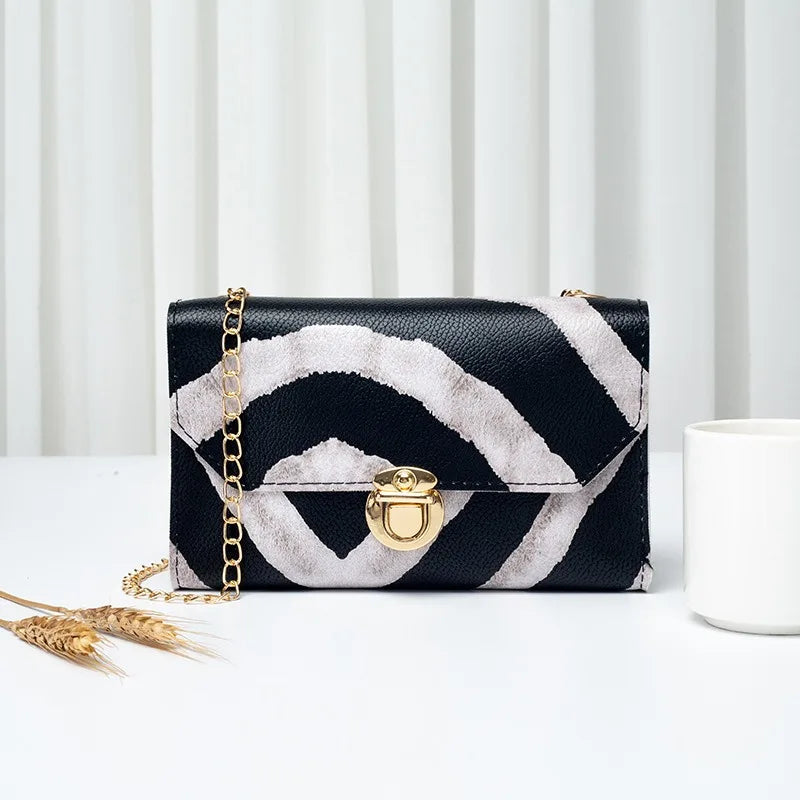 The New 2024 Mini Leopard Print Bag Vintage Chain Single Shoulder Crossbody Handbag Women's Small Square Zebra Mobile Phone Bag