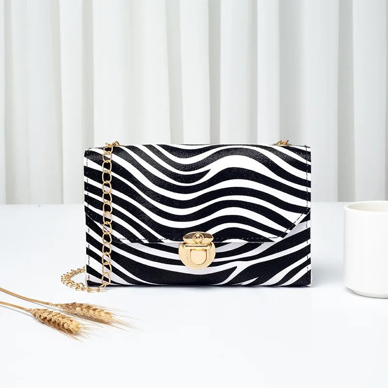 The New 2024 Mini Leopard Print Bag Vintage Chain Single Shoulder Crossbody Handbag Women's Small Square Zebra Mobile Phone Bag