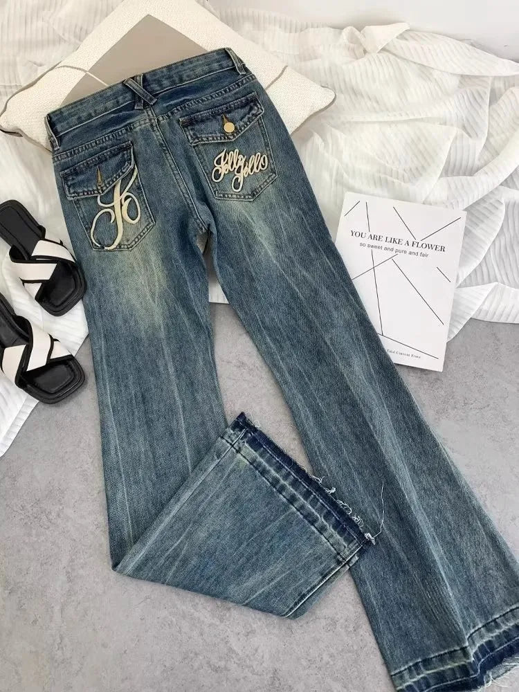 American retro low-waisted jeans female autumn new embroidery old casual fashion temperament slim Joker bell bottoms.