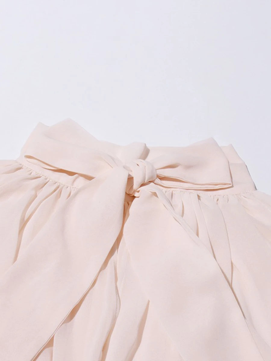 TWOTWINSTYLE Solid Loose Sheer Spliced Folds Fashion Blouses for Women High Neck Long Sleeves Irregular Blouse Female Clothing