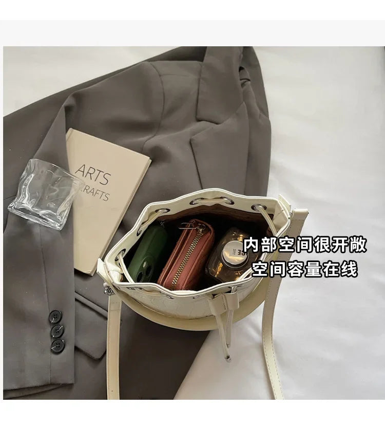 2025 New Trendy Women's Drawstring Tote Bag - Vintage Stone Texture Crossbody Satchel with Retro Minimalist Design