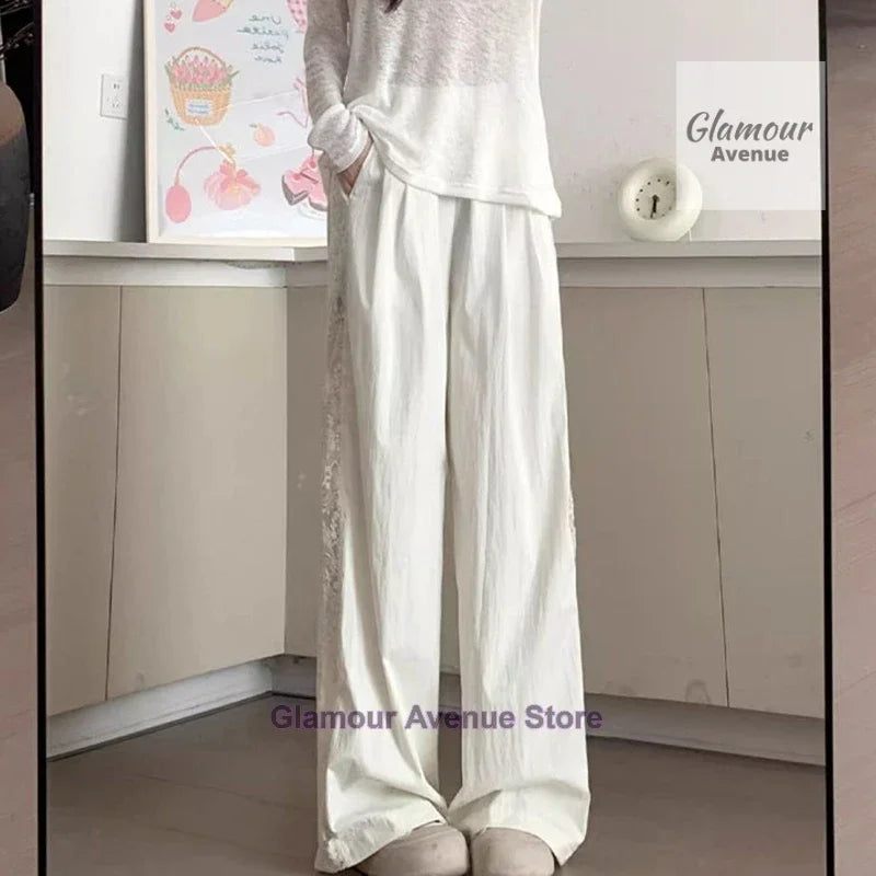 French retro lace design stitching pants women's summer new fashion temperament straight loose wide leg drop casual pants.
