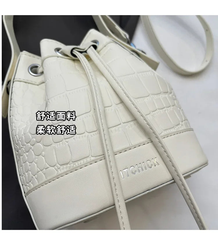 2025 New Trendy Women's Drawstring Tote Bag - Vintage Stone Texture Crossbody Satchel with Retro Minimalist Design