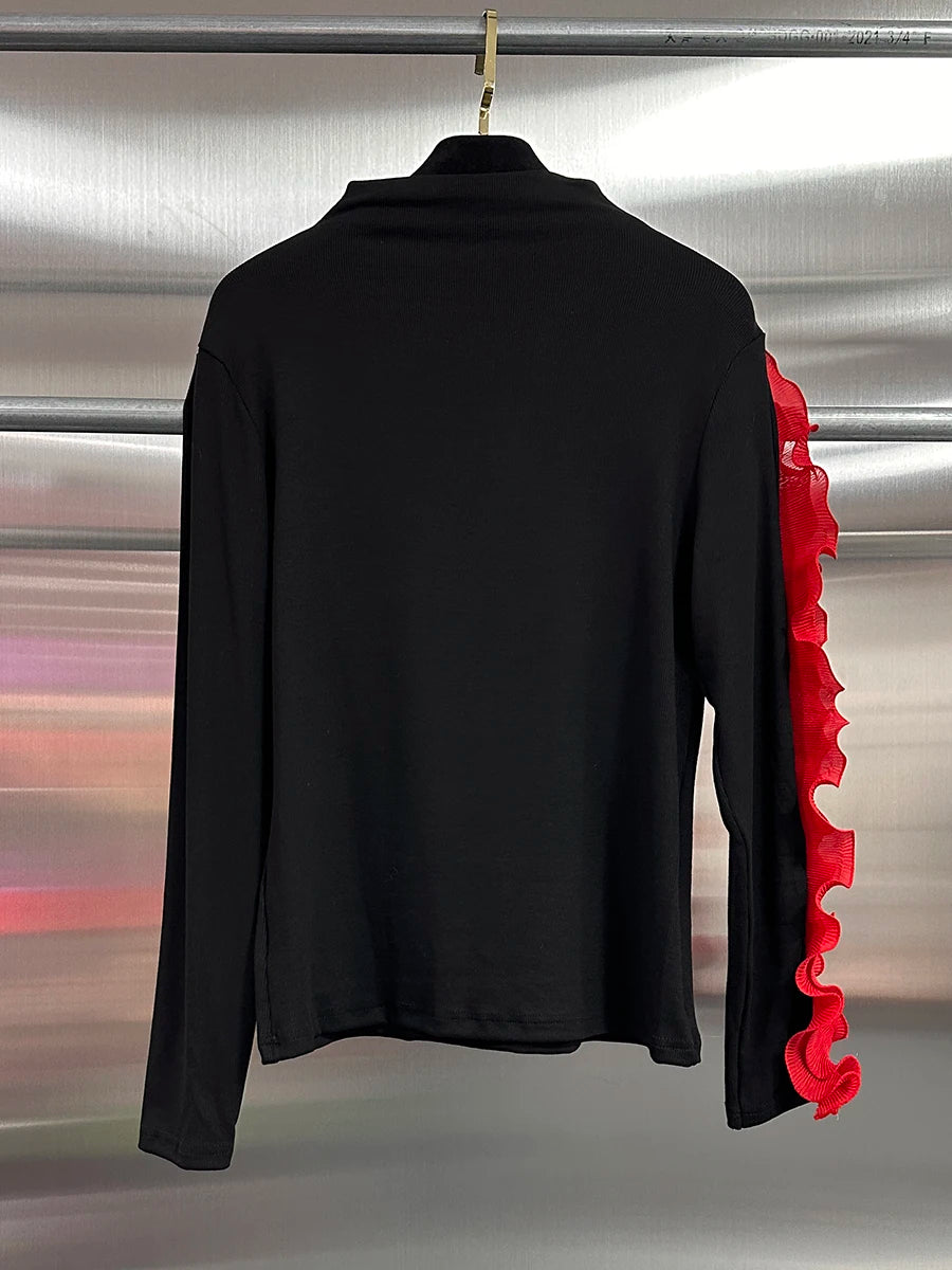 VGH Temperament Spliced Fungus Shirt For Women Turtleneck Petal Sleeve Slimming Chic Elegant Hit Color Blouse Female Spring New