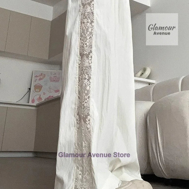French retro lace design stitching pants women's summer new fashion temperament straight loose wide leg drop casual pants.