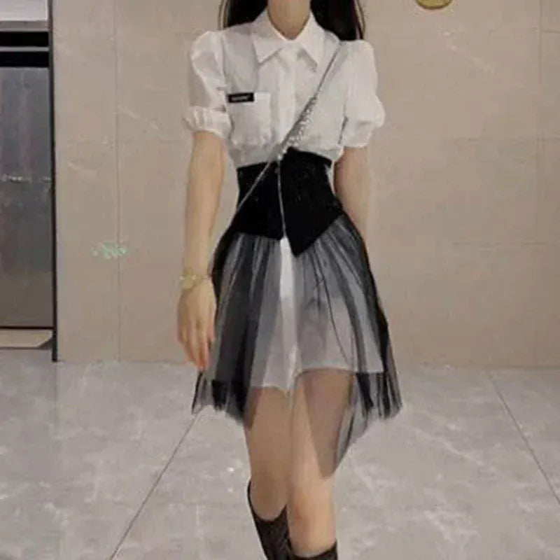 Two-piece dress is fashionable, western-style, long lapel, slim, waist mesh and asymmetric shirt skirt.