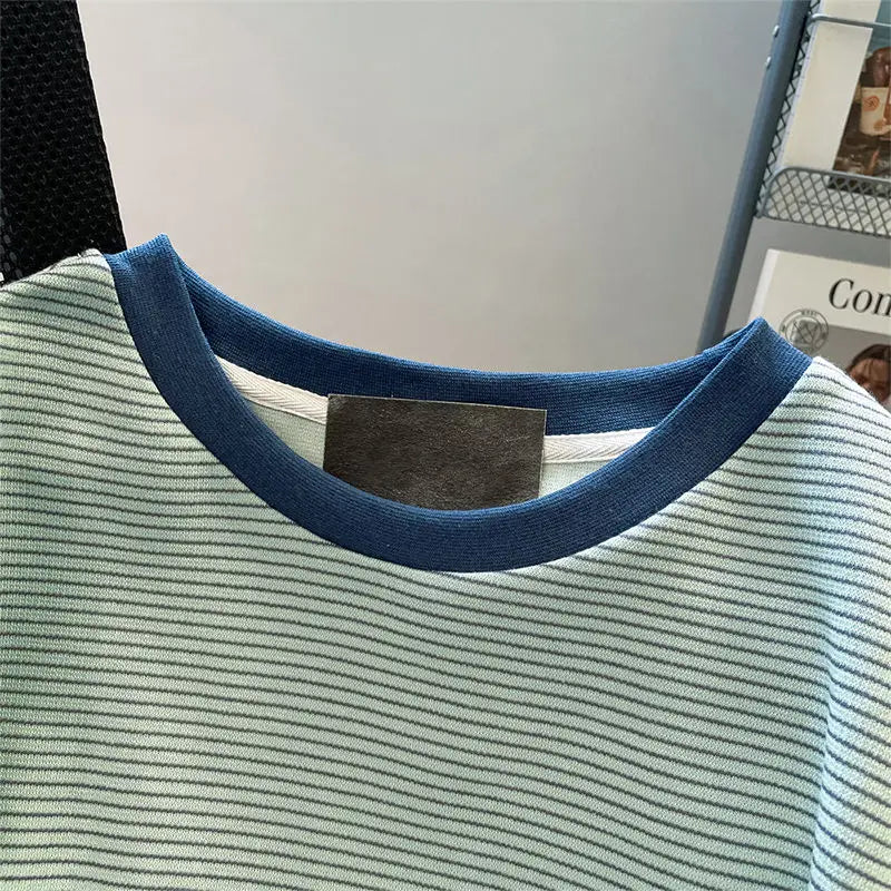 Green striped T-shirt female summer new shoulder design sense fashion niche stitching chic flying sleeves loose clothes.