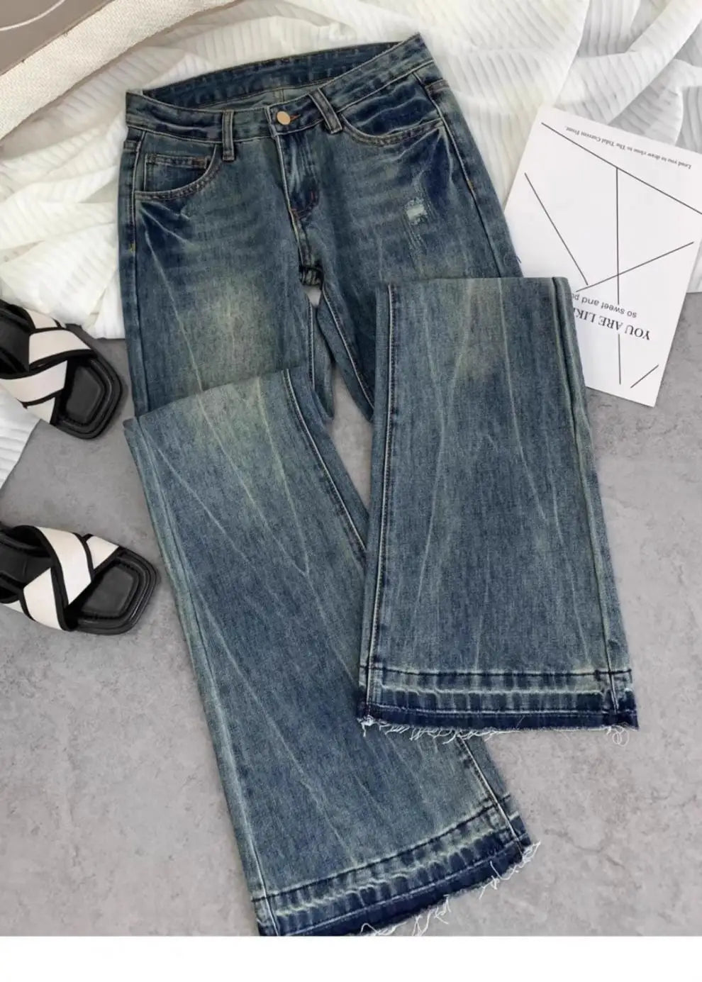 American retro low-waisted jeans female autumn new embroidery old casual fashion temperament slim Joker bell bottoms.