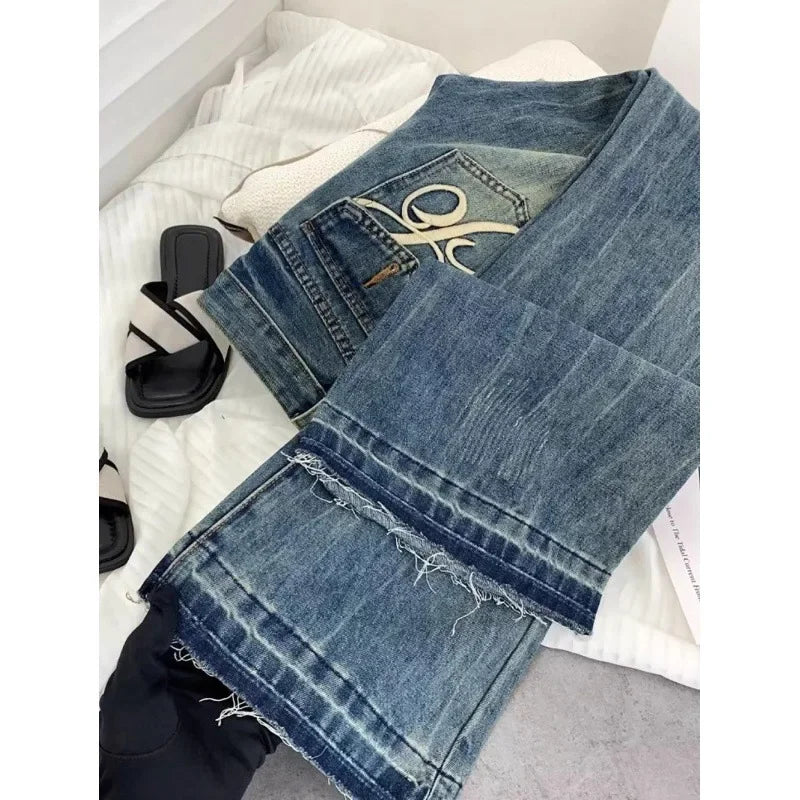 American retro low-waisted jeans female autumn new embroidery old casual fashion temperament slim Joker bell bottoms.
