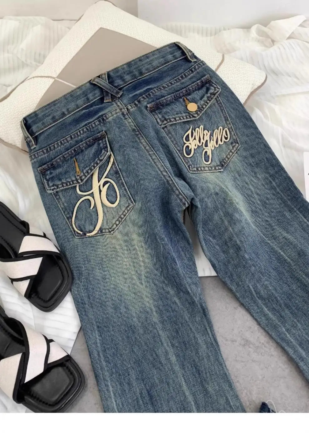 American retro low-waisted jeans female autumn new embroidery old casual fashion temperament slim Joker bell bottoms.