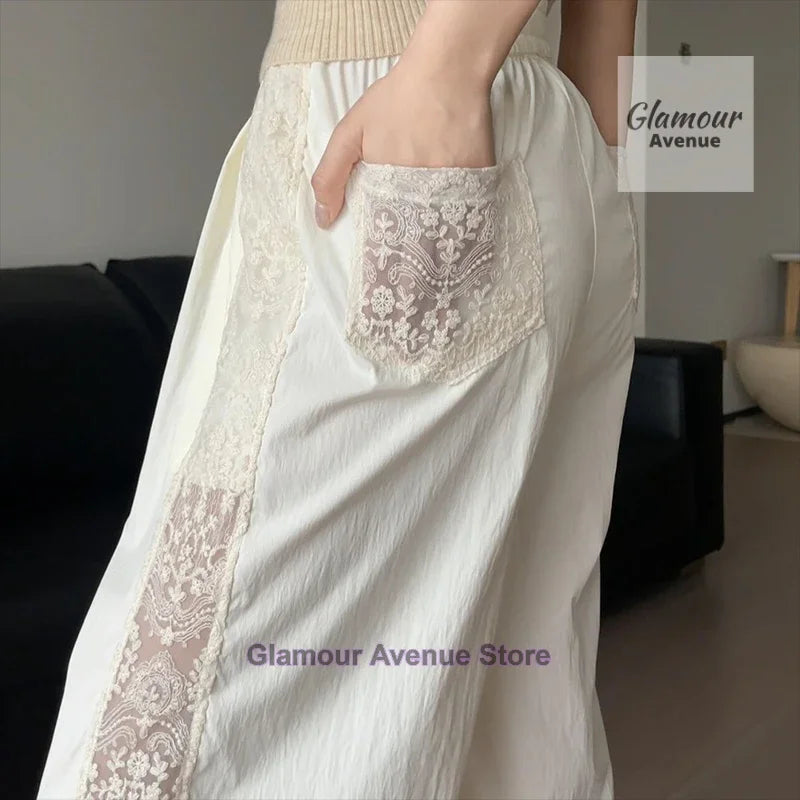 French retro lace design stitching pants women's summer new fashion temperament straight loose wide leg drop casual pants.