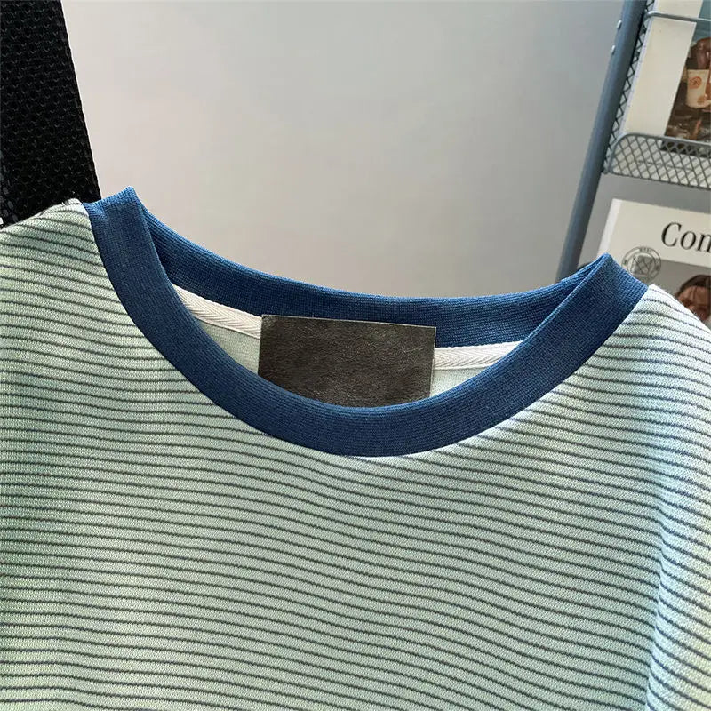Green striped T-shirt female summer new shoulder design sense fashion niche stitching chic flying sleeves loose clothes.