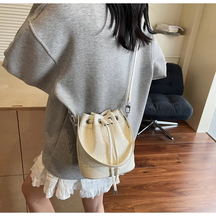 2025 New Trendy Women's Drawstring Tote Bag - Vintage Stone Texture Crossbody Satchel with Retro Minimalist Design