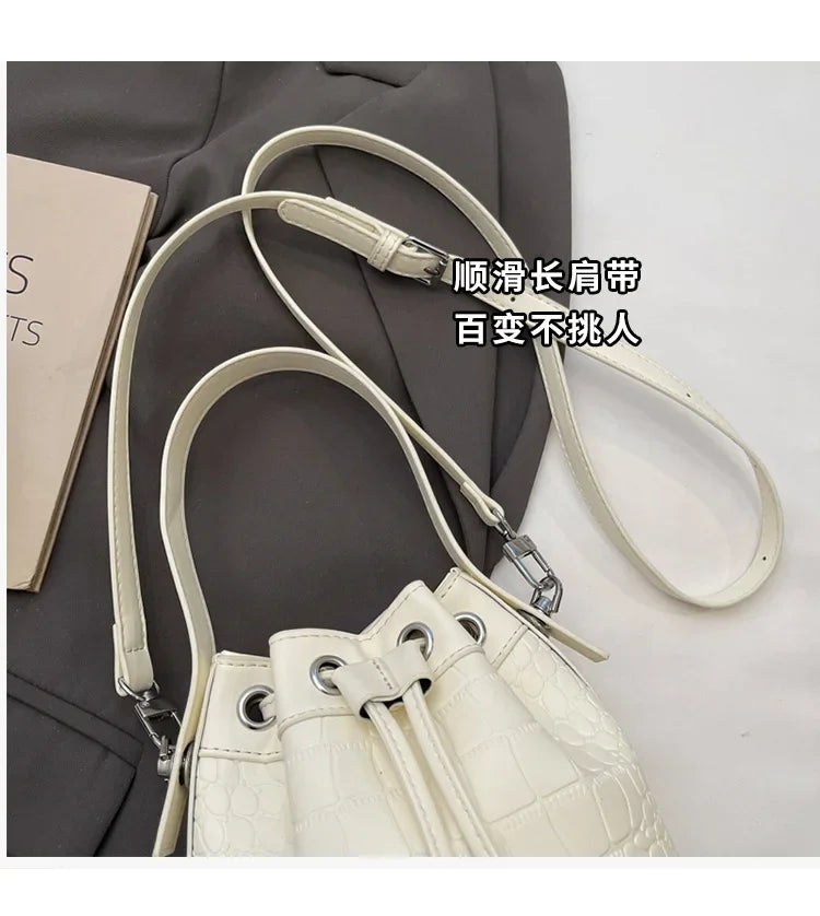 2025 New Trendy Women's Drawstring Tote Bag - Vintage Stone Texture Crossbody Satchel with Retro Minimalist Design