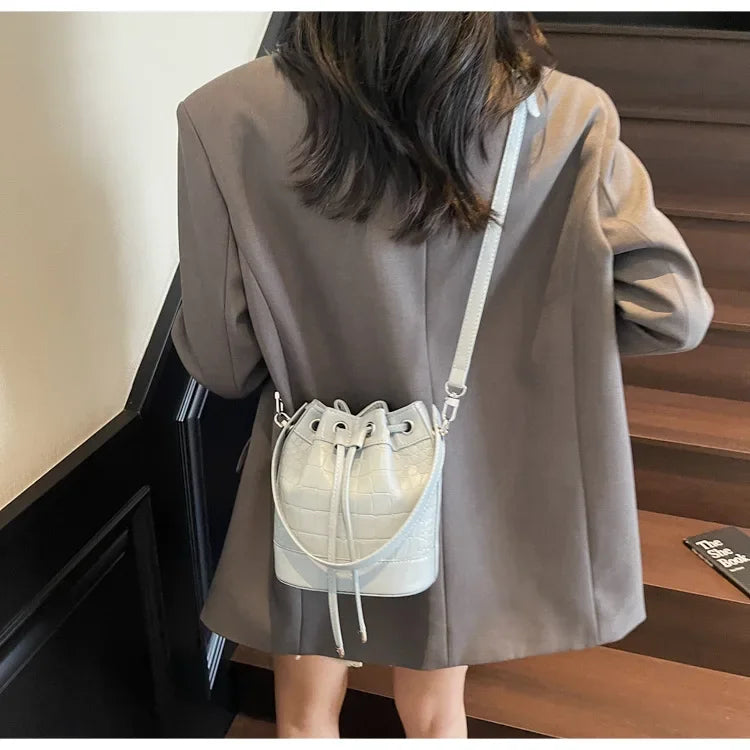 2025 New Trendy Women's Drawstring Tote Bag - Vintage Stone Texture Crossbody Satchel with Retro Minimalist Design