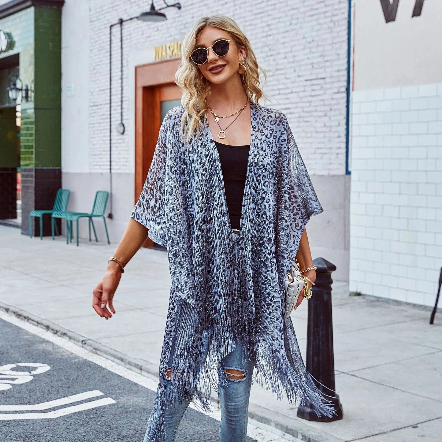 Dongguan Hong Xing Yue 2024 ladies travel summer new hollowed-out smock cape cover solid color leopard print smock cape tassel