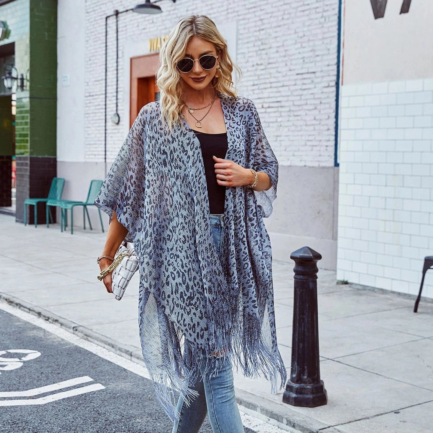 Dongguan Hong Xing Yue 2024 ladies travel summer new hollowed-out smock cape cover solid color leopard print smock cape tassel