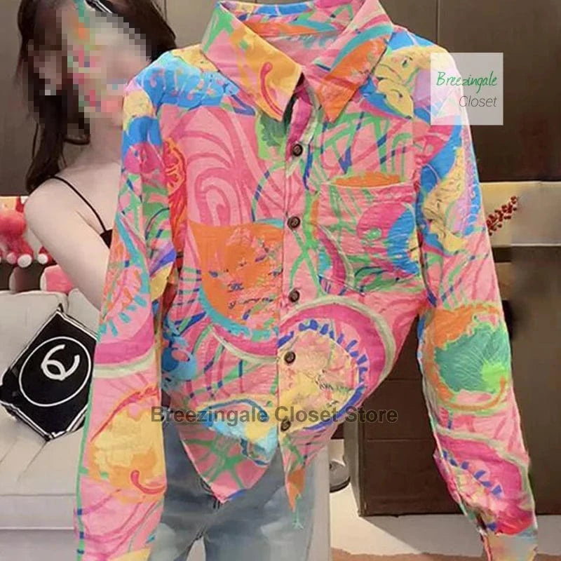 French fashion color printing long-sleeved shirt women's summer new fashion design sense temperament plus size loose Joker top.