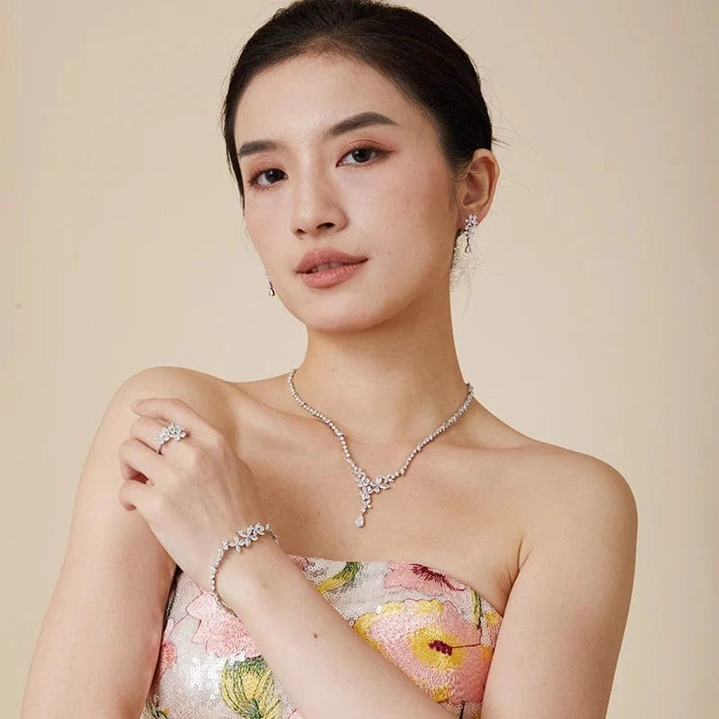 Geometry / platinum Four small flowers, simple and fashionable, inlaid with zircon, wedding dress, anniversary celebration, women's earring matching