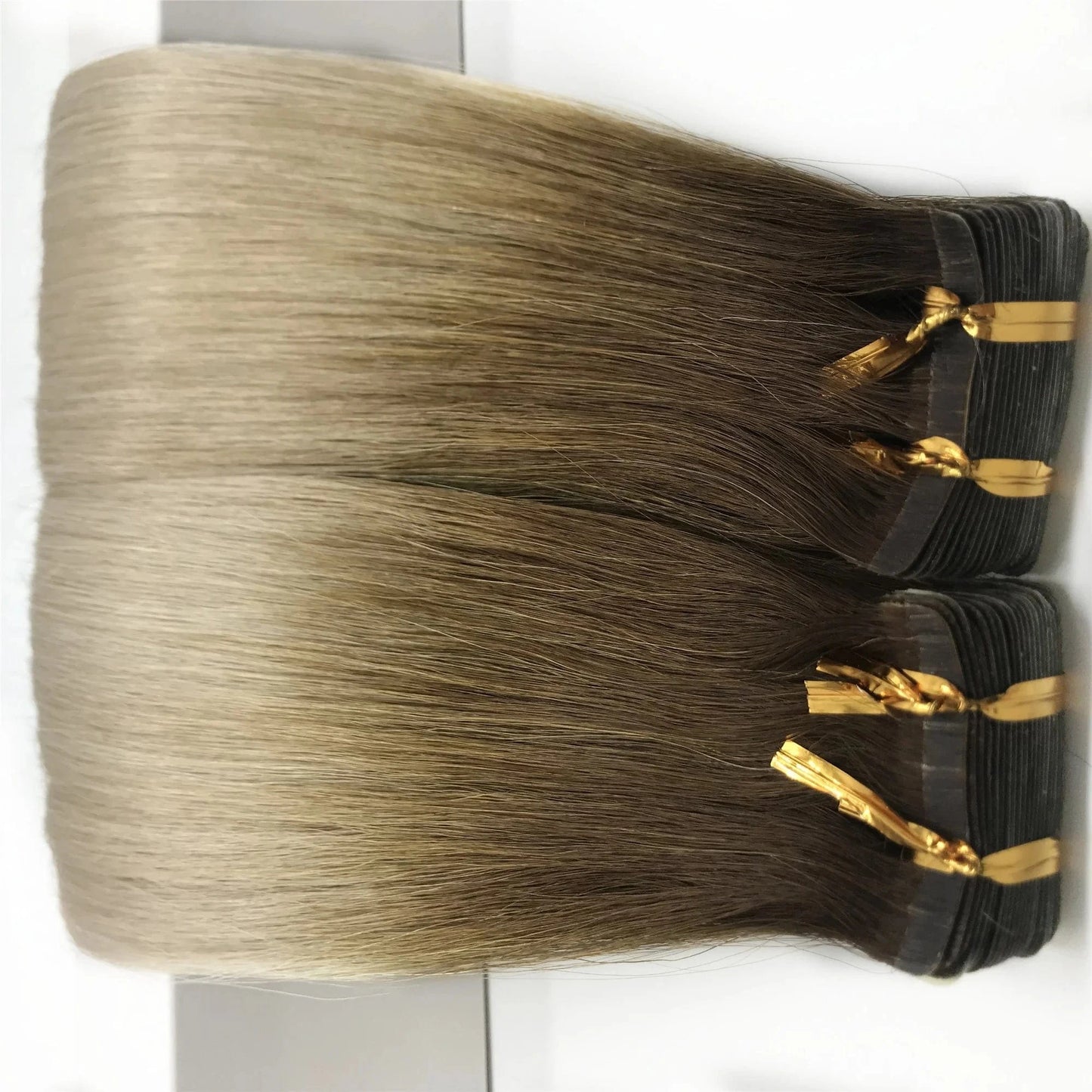 Hot sell invisible virgin remy russian/brazilian cuticle aligned invisible tape in human hair extension