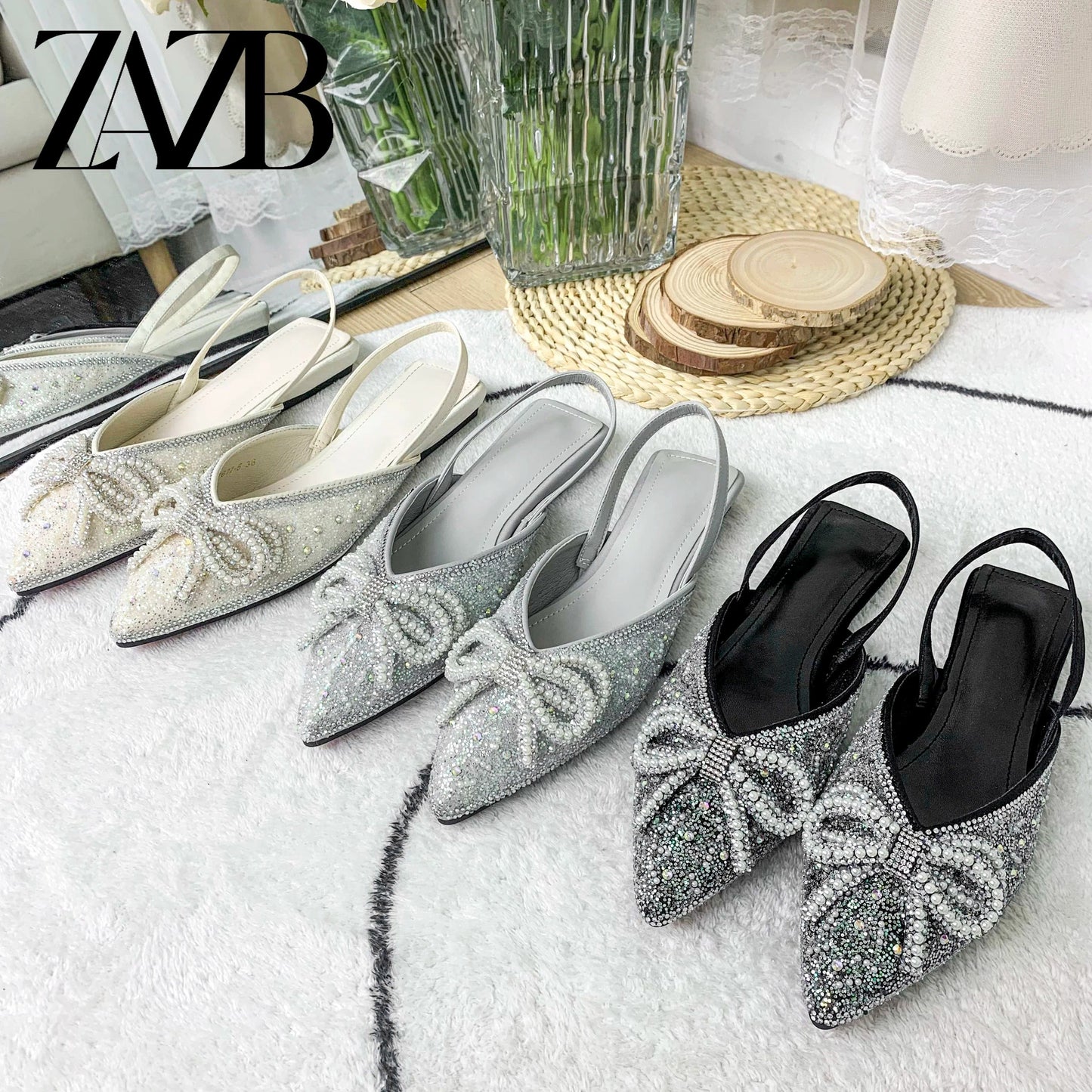 New summer wholesale bowknot Pointed head women's flat sandals Rome fashion One word band shoes Elegant office