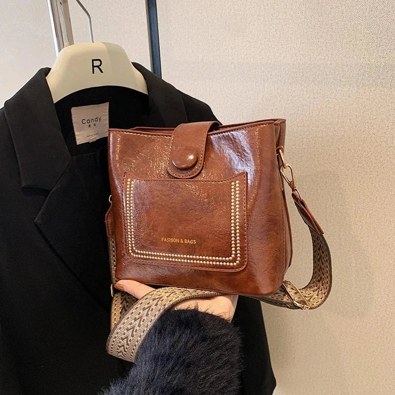 Wholesale New Fashion Bucket handbags 2024 Light Lady Wide Shoulder Strip Bags Lady Design Purses For Women