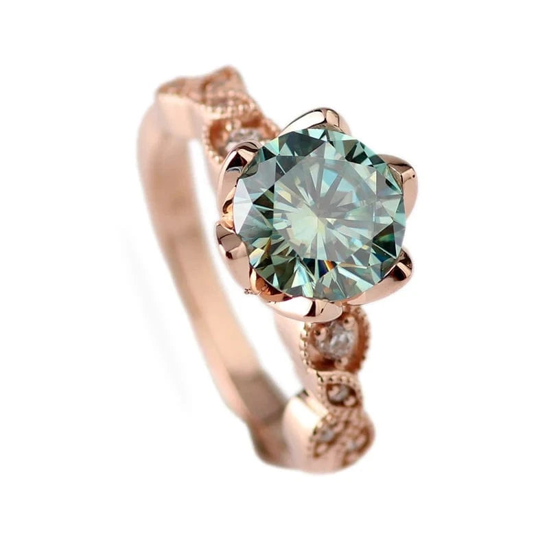 Stylish eternity 10k rose gold engagement ring with 1.5cts light blue round cut moissanite diamond