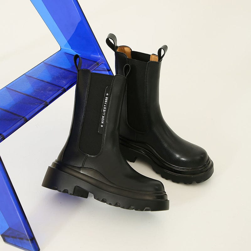 TX graphic piping Pull calfskin elasticated sides contrast sole ribbon pull tab Leather lining and insole Chelsea boot