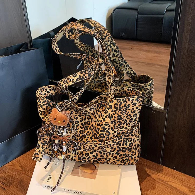 Fashion Versatile Leopard Print Tote Bag Women Large-capacity Canvas Shoulder Bag Work Commuting Relaxing Handbag With Pendant