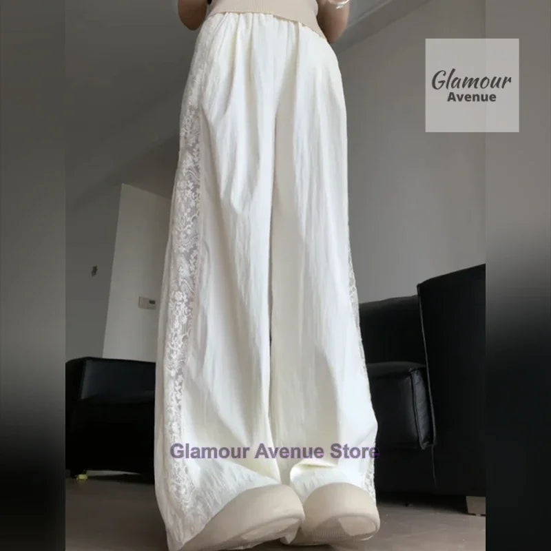 French retro lace design stitching pants women's summer new fashion temperament straight loose wide leg drop casual pants.