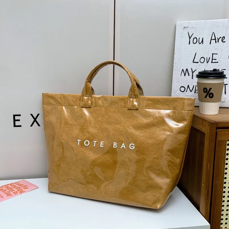 Kraft paper jelly waterproof bag, women's new retro commuting large capacity DuPont paper tote bag