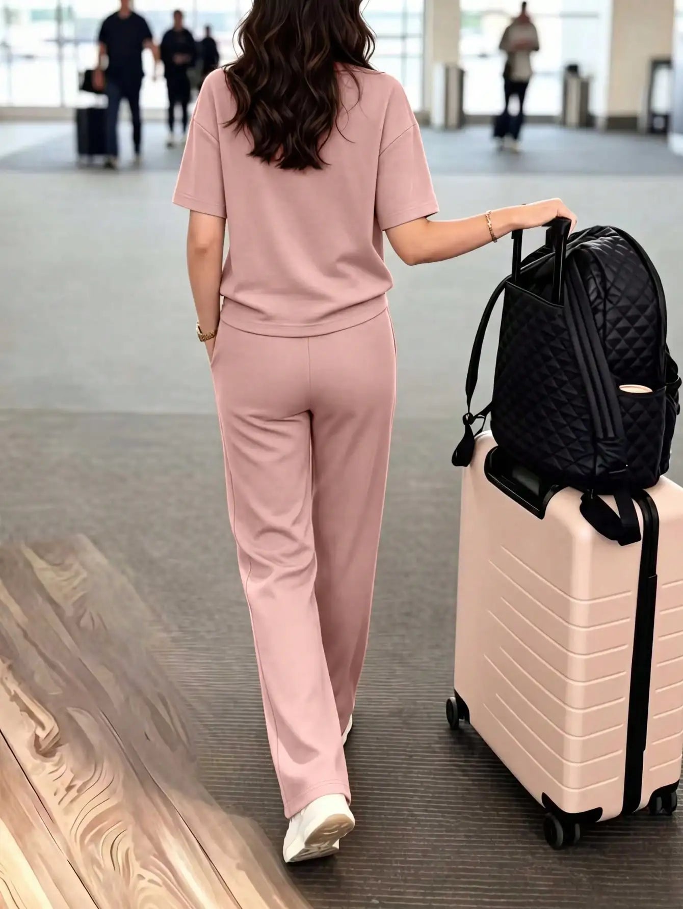Women's casual two-piece set: crew neck T-shirt paired with long stretchy pants, comfortable loungewear set with pockets