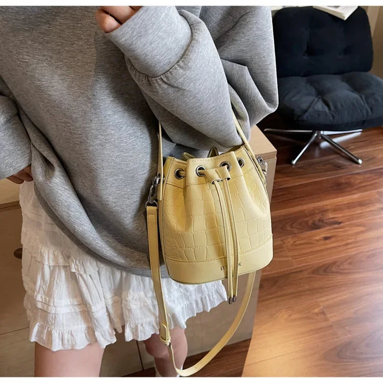 2025 New Trendy Women's Drawstring Tote Bag - Vintage Stone Texture Crossbody Satchel with Retro Minimalist Design