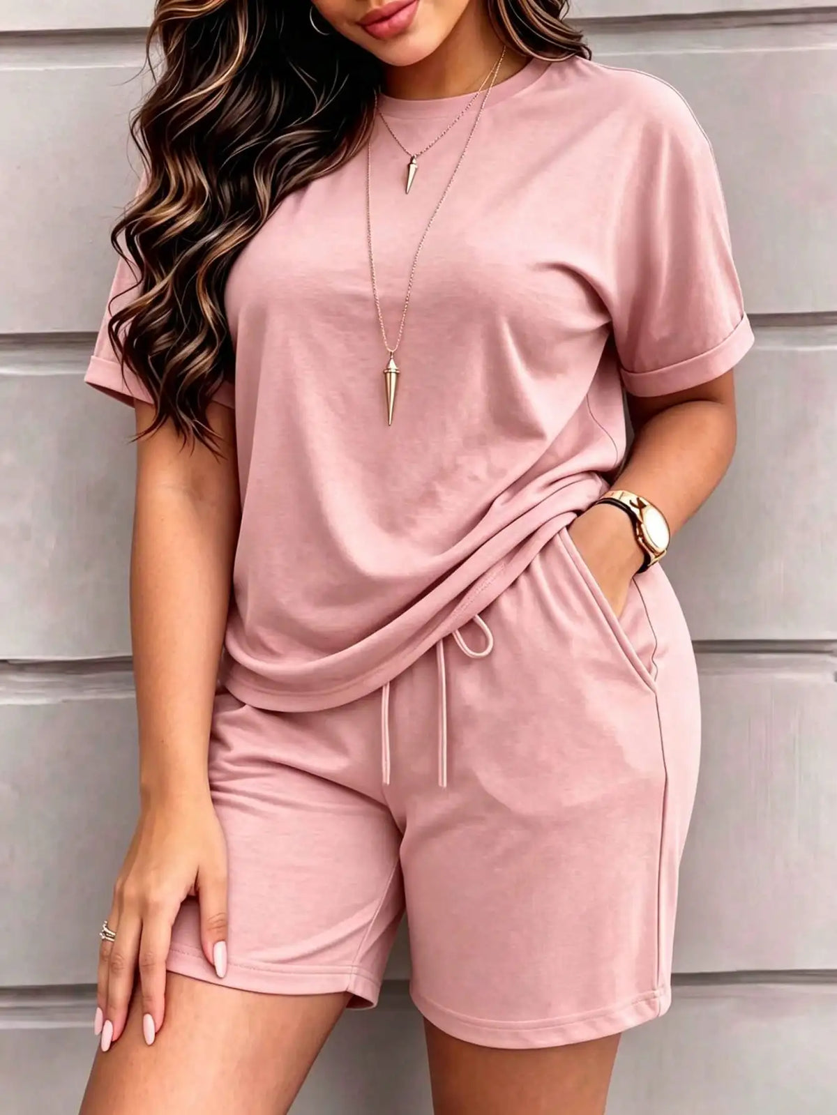 Spring and summer women’s clothing: Solid-color short-sleeved, retro round-neck T-shirts paired with elastic-waisted shorts. A simple, sporty and casual two-piece set.
