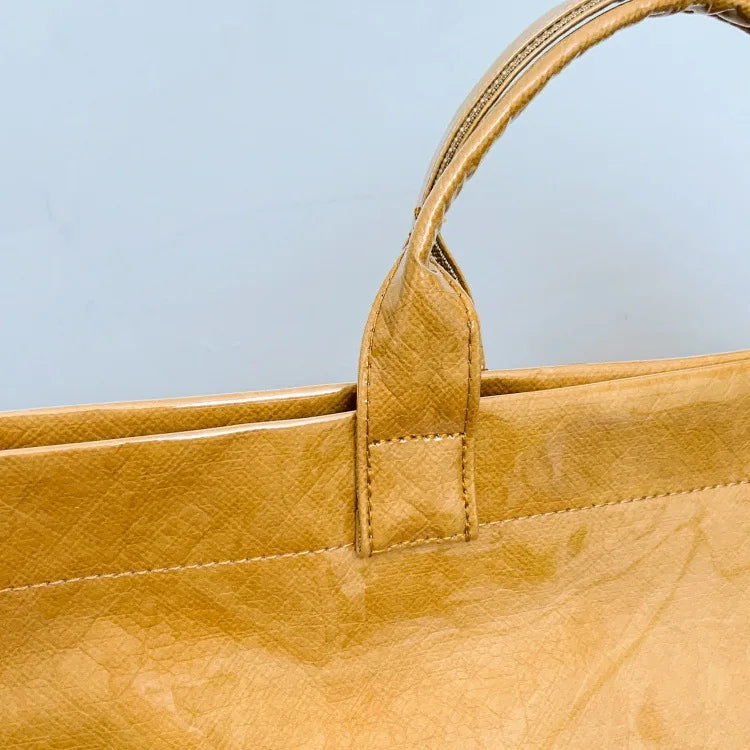 Kraft paper jelly waterproof bag, women's new retro commuting large capacity DuPont paper tote bag