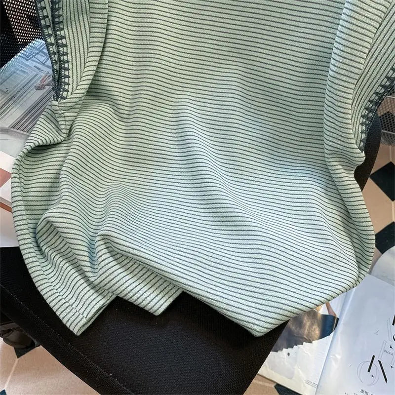 Green striped T-shirt female summer new shoulder design sense fashion niche stitching chic flying sleeves loose clothes.
