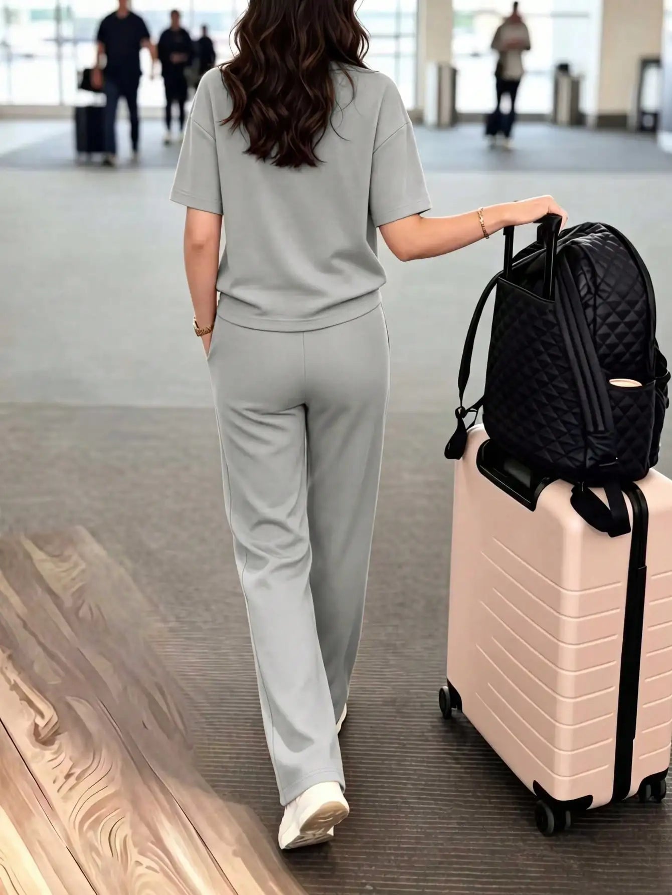 Women's casual two-piece set: crew neck T-shirt paired with long stretchy pants, comfortable loungewear set with pockets