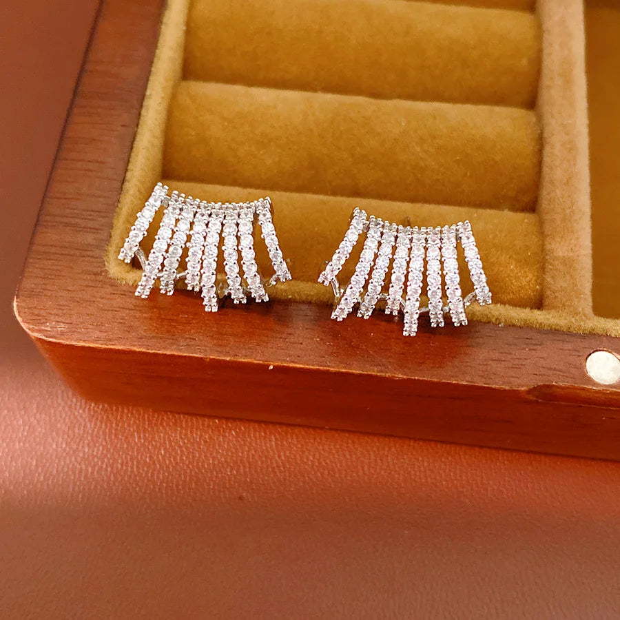 Gold Tone Curved Cubic Zirconia Earrings