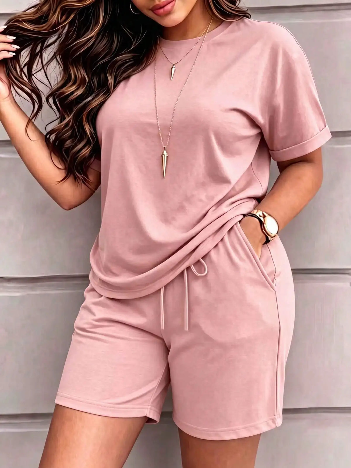 Spring and summer women’s clothing: Solid-color short-sleeved, retro round-neck T-shirts paired with elastic-waisted shorts. A simple, sporty and casual two-piece set.