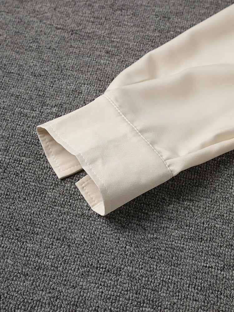 [EAM] Women Beige Zipper Pocket Back Bandage Blouse New Lapel Long Sleeve Loose Fit Shirt Fashion Spring Autumn 2025 1DF1491
