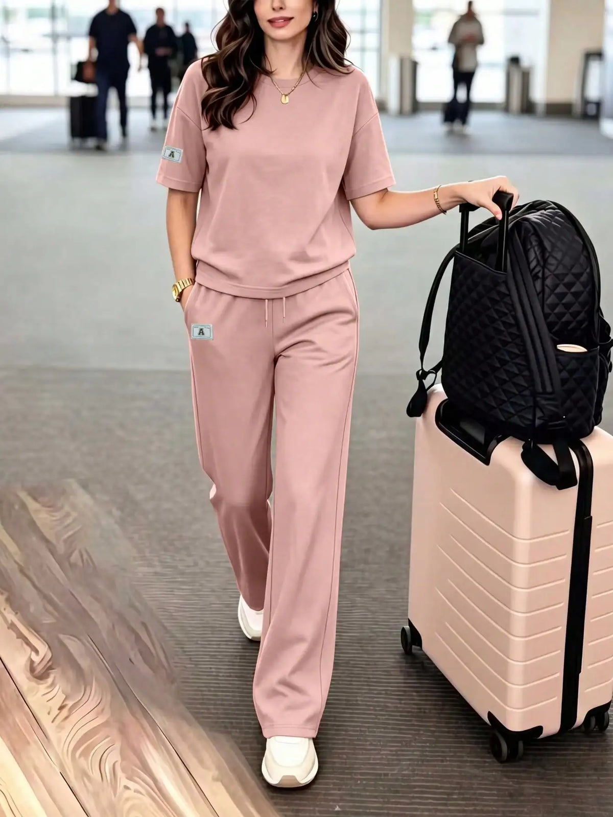 Women's casual two-piece set: crew neck T-shirt paired with long stretchy pants, comfortable loungewear set with pockets