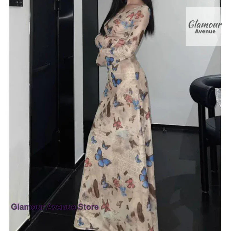 Korean retro spice wind butterfly print long-sleeved dress female summer new fashion sexy slim fold waist pocket hip dress
