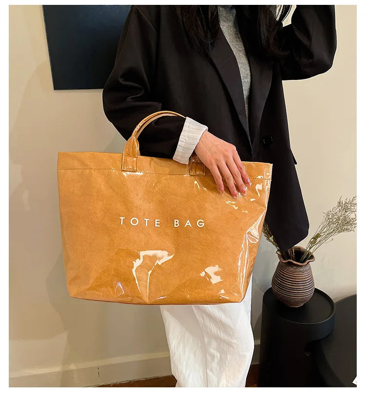 Kraft paper jelly waterproof bag, women's new retro commuting large capacity DuPont paper tote bag