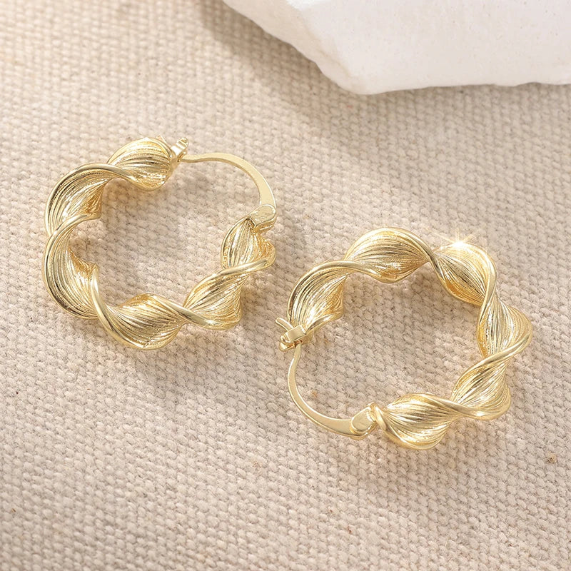 Carved Twisted Gold Tone Hoop Earrings