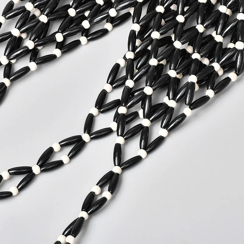 Hollow wood bead straw bag lady fashion brand texture drawstring design shoulder bag simple versatile cylindrical crossbody bag