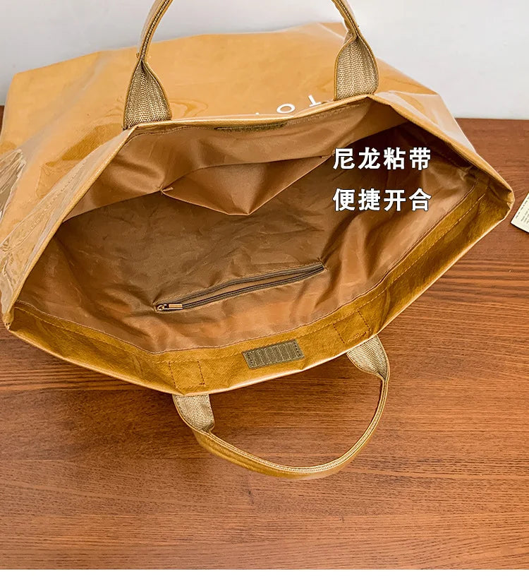 Kraft paper jelly waterproof bag, women's new retro commuting large capacity DuPont paper tote bag