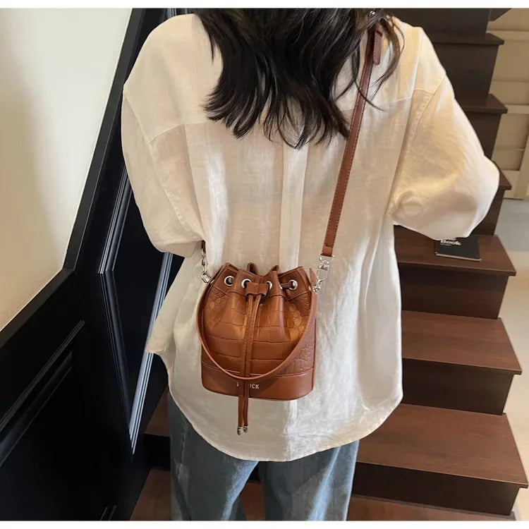 2025 New Trendy Women's Drawstring Tote Bag - Vintage Stone Texture Crossbody Satchel with Retro Minimalist Design